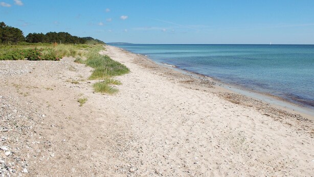Nær stranden og fisking