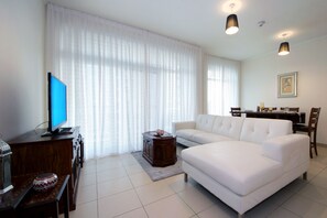 Apartment, 1 Bedroom | Living area | LED TV - Piks Key - Burj Views B (Dubai)