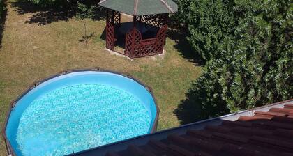 Holiday home with balcony and garden furniture