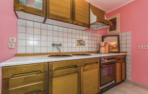 Fridge, stovetop, coffee/tea maker, cookware/dishes/utensils