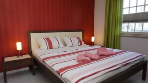 2 quartos, berço de viagem, Wi-Fi, roupa de cama