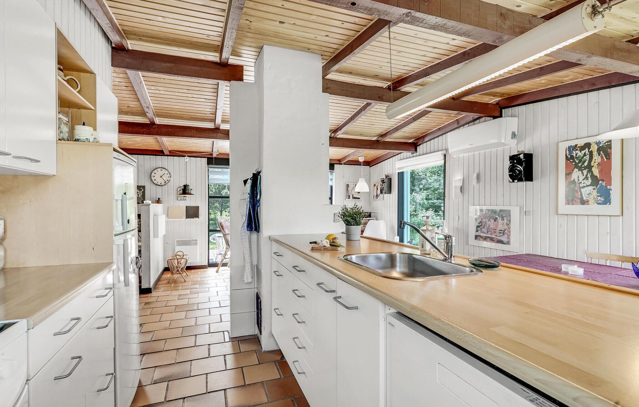 Fridge, stovetop, dishwasher, coffee/tea maker