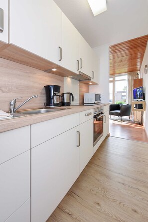 Réfrigérateur, micro-ondes, four, lave-vaisselle