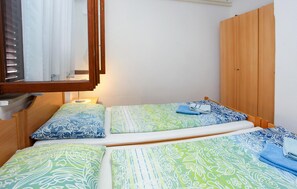 1 bedroom, travel crib, WiFi, bed sheets