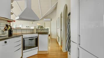 Fridge, stovetop, dishwasher, coffee/tea maker