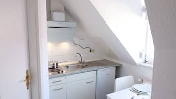 Fridge, coffee/tea maker, electric kettle, toaster