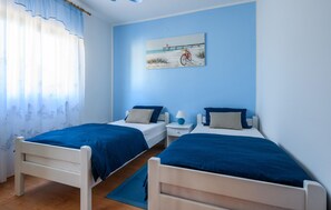 2 quartos, berço de viagem, Wi-Fi de cortesia, roupa de cama