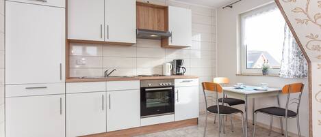 Fridge, coffee/tea maker, electric kettle, toaster