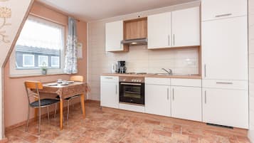 Fridge, coffee/tea maker, electric kettle, toaster