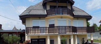 Holiday apartment with children's playground, sandbox and paddling pool