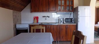 Holiday apartment with children's playground, sandpit and paddling pool