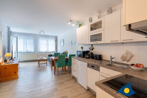 Coffee/tea maker, fridge, microwave, oven