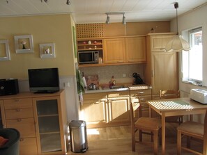 Fridge, microwave, high chair