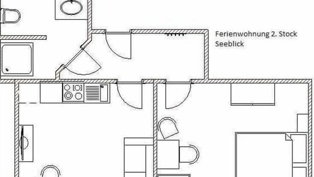 Ein Grundriss eines Hotelzimmers mit Küchenzeile, Bad und einer Sitzecke.