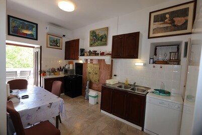 Holiday home with terrace and air conditioning