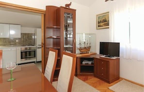 Fridge, stovetop, dishwasher, coffee/tea maker