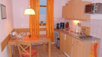 Fridge, microwave, coffee/tea maker, toaster