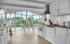 Fridge, stovetop, dishwasher, coffee/tea maker