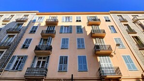 A multi-story building with balconies and windows, likely a hotel or residential building. - N&J - COLIBRI PRESTIGE - Central - By sea (Niza)