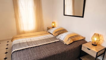 4 chambres, fer et planche à repasser, lit parapluie, Wi-Fi gratuit