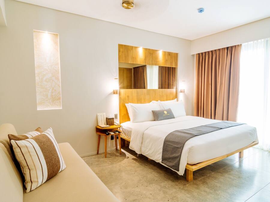 Luxe beddengoed, een kluis op de kamer, een strijkplank/strijkijzer