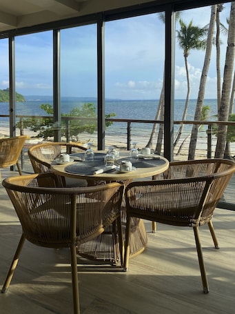 Breakfast, lunch served; local and international cuisine, beach views