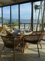 Breakfast, lunch served; local and international cuisine, beach views 