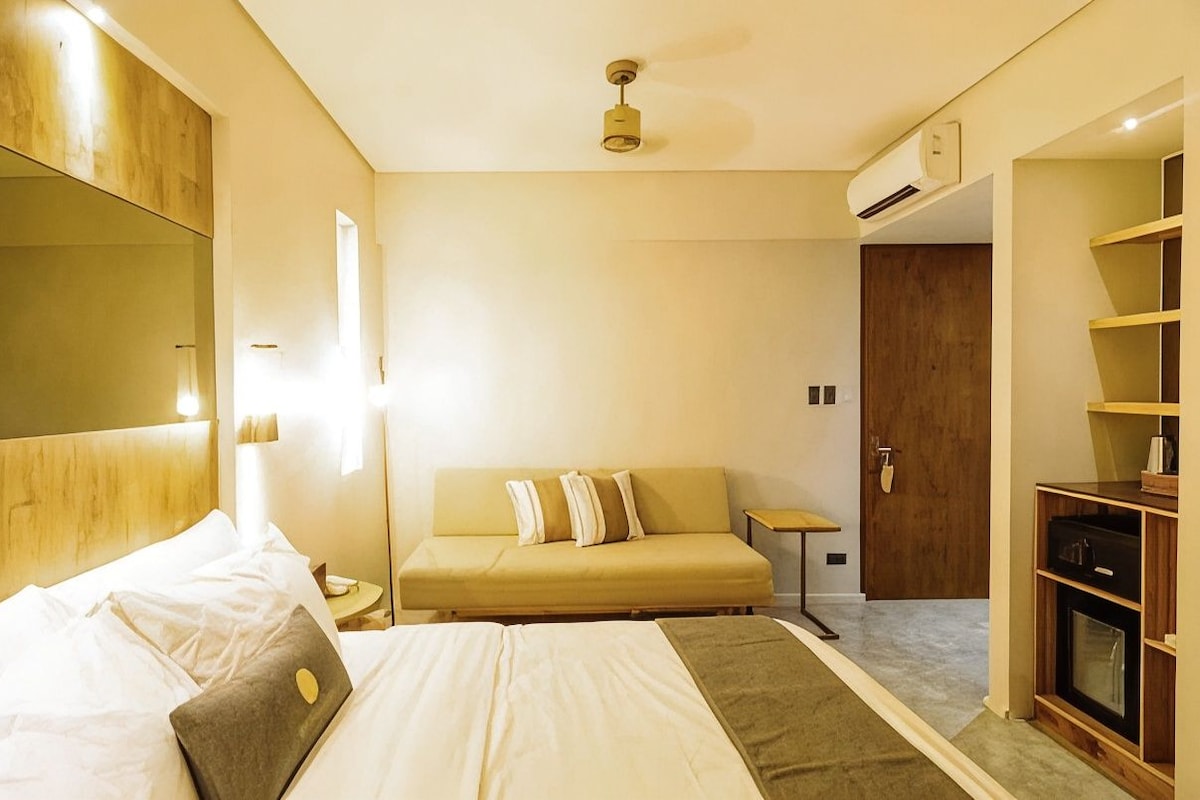 Luxe beddengoed, een kluis op de kamer, een strijkplank/strijkijzer