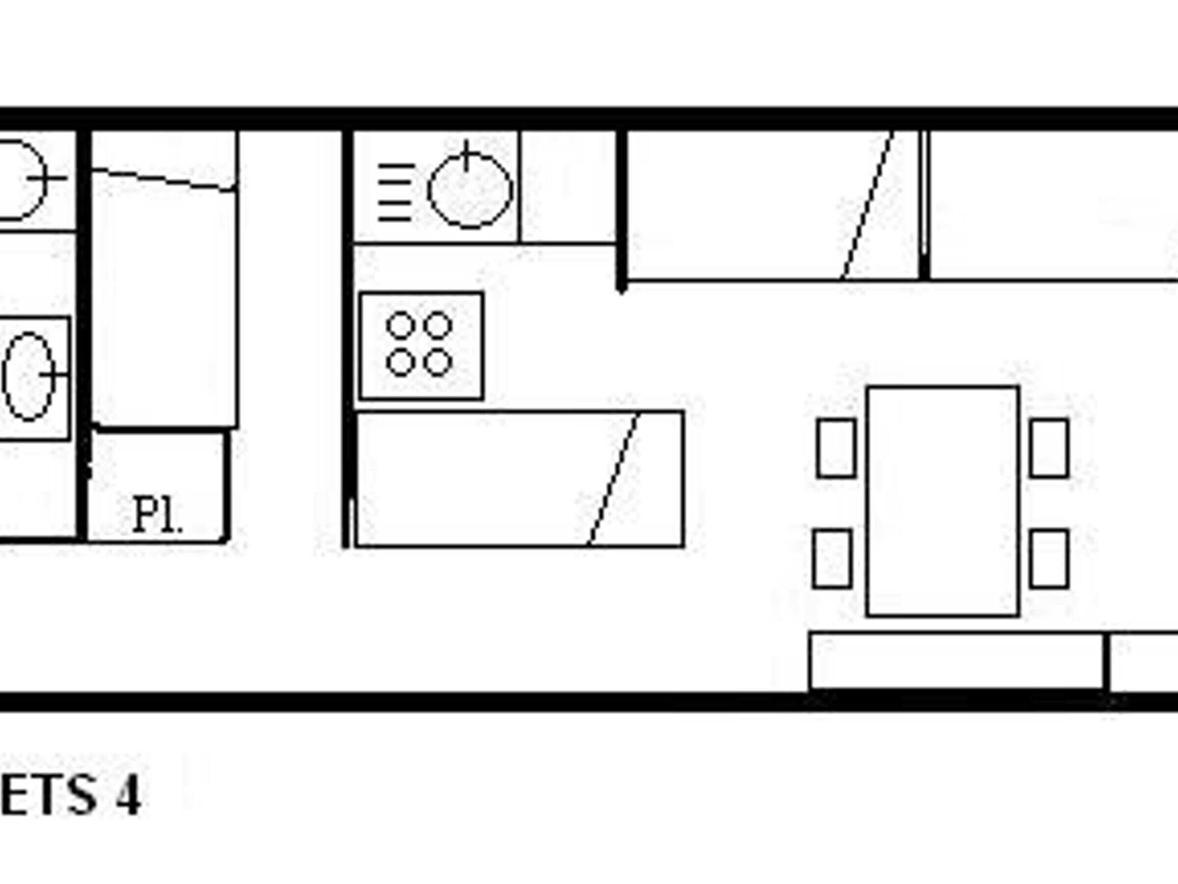 A floor plan with a kitchen area, a dining area, and a living room.