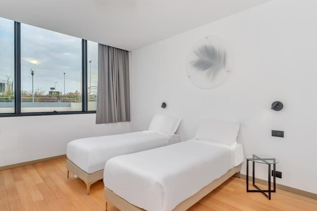 Twin Room, 2 Single Beds, Non Smoking | In-room safe, desk, soundproofing, free WiFi