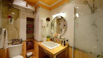 Bathtub, hair dryer, towels