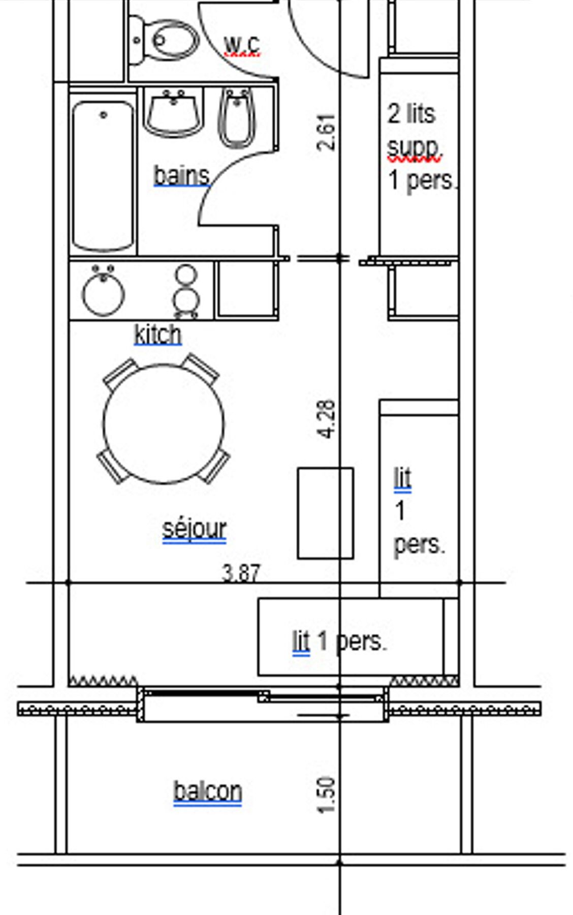 A floor plan with a kitchen, dining area, WC, and balcony.