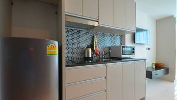Studio | Private kitchenette | Full-size fridge, microwave, stovetop, electric kettle