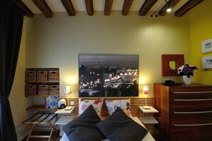 Coffres-forts dans les chambres, fer et planche à repasser