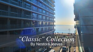 A multi-story hotel with balconies overlooking a body of water. - N&J - TROIS PROMENADE - Central - Very close sea (Niza)