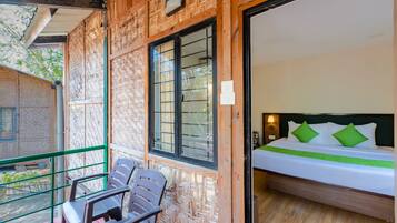 Tree Top AC Room | Desk, rollaway beds, bed sheets