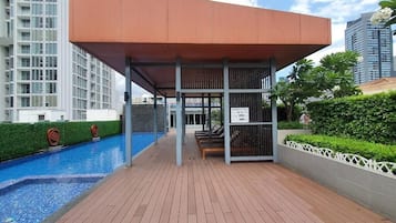 Outdoor pool, open 7:00 AM to 10:00 PM, sun loungers
