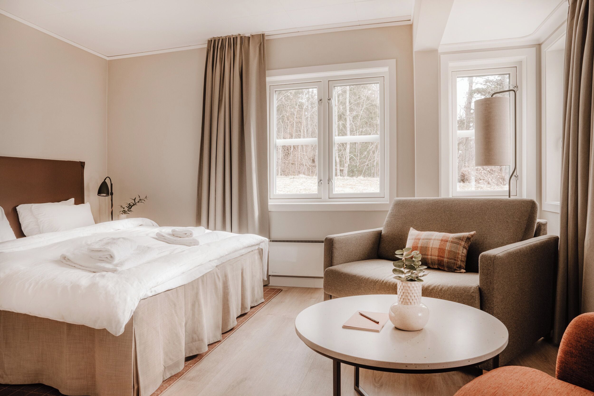 family room | 1 bedroom, desk, blackout curtains, iron/ironing board