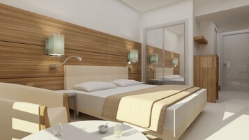 Un dormitorio moderno con una cama grande, mesitas de noche, un espejo y una pequeña mesa con vasos y un cuenco.