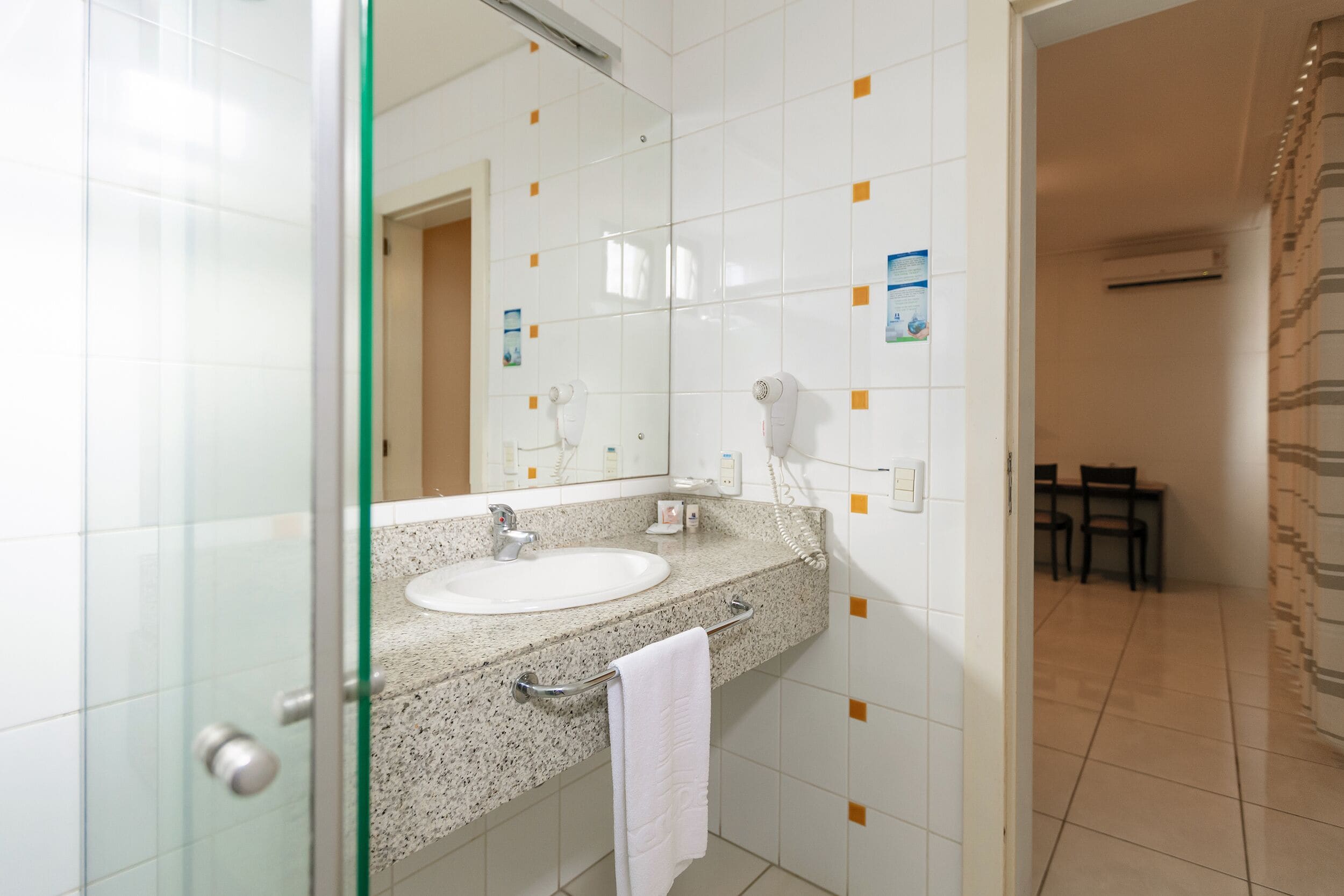 deluxe double room | bathroom | shower, rainfall showerhead, hair dryer, towels