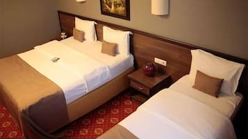 Ropa de cama de alta calidad, minibar y escritorio