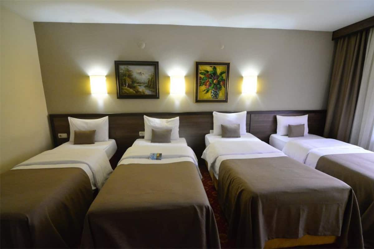 quadruple room | 1 bedroom, premium bedding, minibar, desk