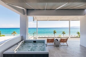 Dúplex, bañera de hidromasaje, vistas al mar | Bañera de hidromasaje privada