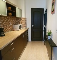 Comfort Studio Suite, 1 Double Bed with Sofa bed, City View | Private kitchen | Fridge, microwave, stovetop, coffee/tea maker
