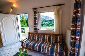 Apartment, 1 Bedroom, Sea View (MD) | Living area | Plasma TV - White Villa (Xylokastro-Evrostina)