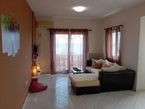 Căn hộ Grand | Khu phòng khách | TV plasma