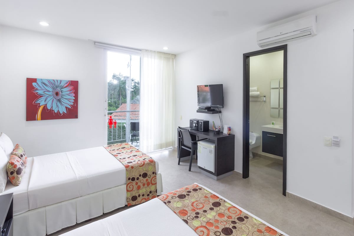 Double Room | Minibar, in-room safe, desk, laptop workspace