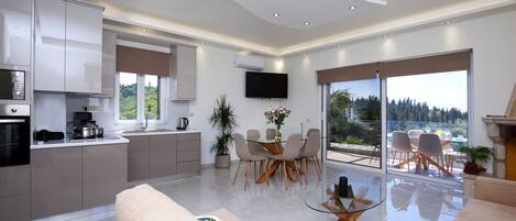 Family Villa, 3 Bedrooms, Private Pool, Sea View (Thanasis) | Living area | 39-inch flat-screen TV with satellite channels, TV