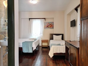 Deluxe-Dreibettzimmer | Hochwertige Bettwaren, Minibar, kostenloses WLAN