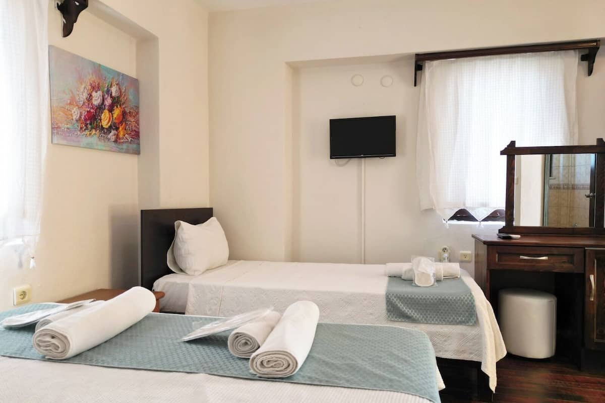 Habitación triple Deluxe | Ropa de cama de alta calidad, minibar y wifi gratis